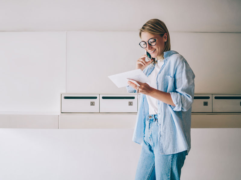 woman checking mail